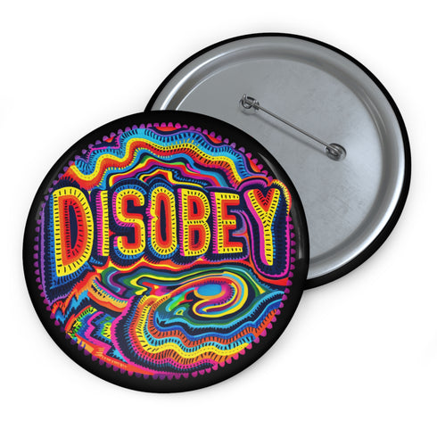 Round black pinback button with neon embroidery-style waves surrounding bold yellow and red "DISOBEY" text.